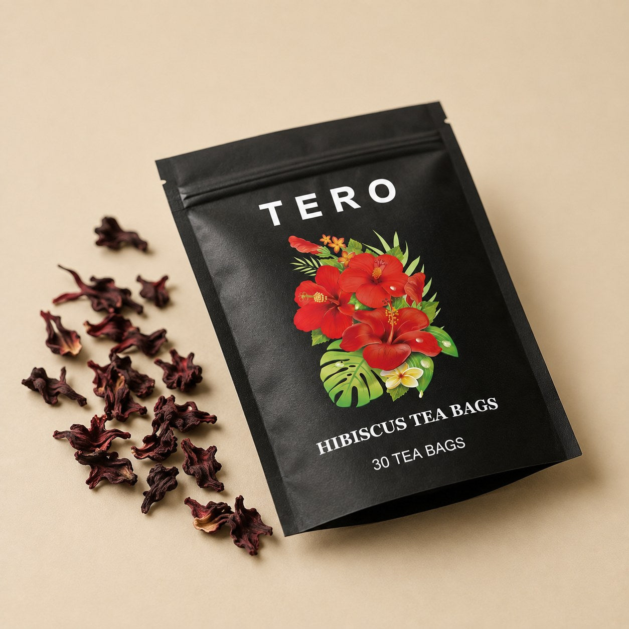 A TERO pack of hibiscus tea bags beside loose dried calyces